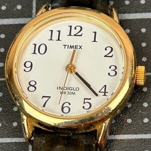 Timex Indiglo Womens Watch Gold Tone White Dial Black Leather Strap WR 30M J9